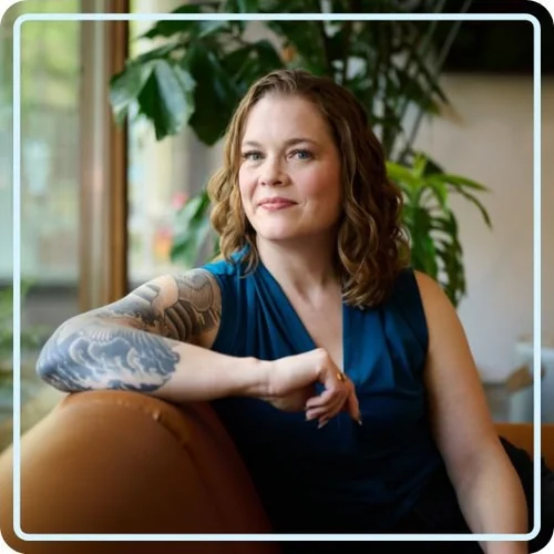 Sara Lobkovich in a professional setting, relaxed and approachable